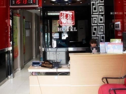 Harbin Xilong Hotel Mai Mai Street Branch Bagian luar foto