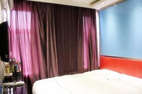 Harbin Xilong Hotel Mai Mai Street Branch Bagian luar foto
