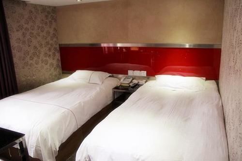 Harbin Xilong Hotel Mai Mai Street Branch Bagian luar foto
